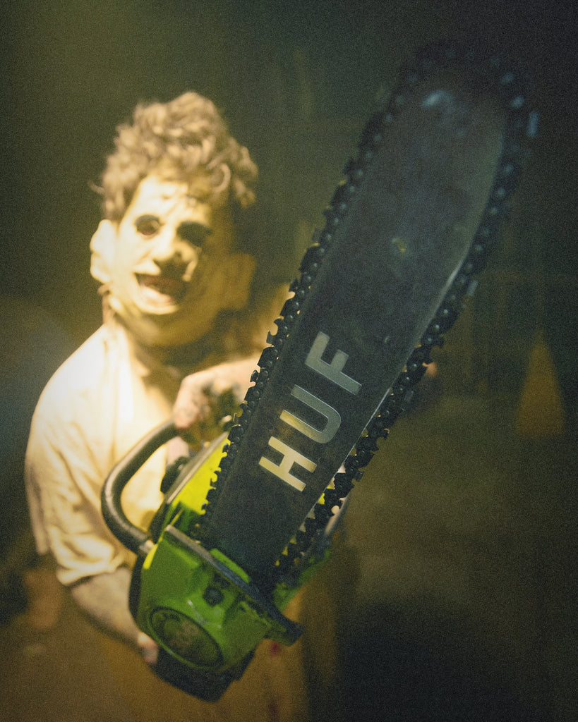 HUF x Texas Chainsaw Massacre collaboration featuring bold designs with Leatherface and horror-inspired graphics.